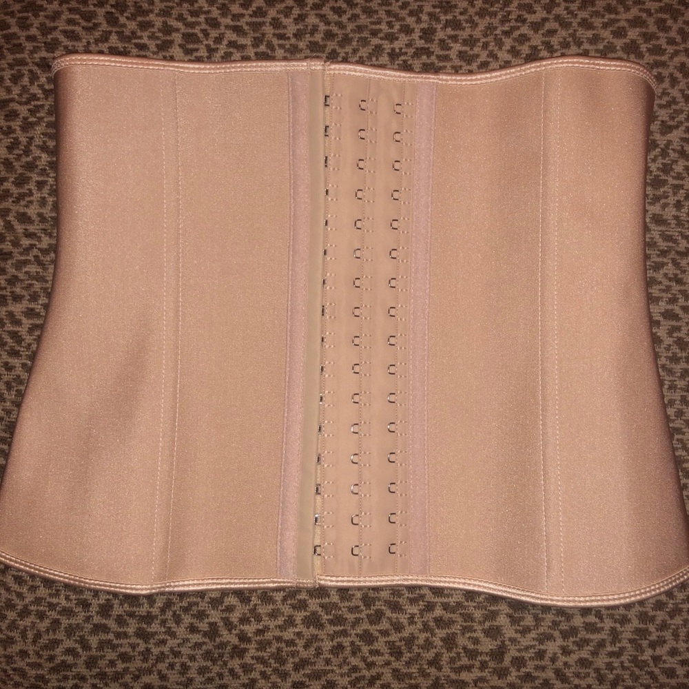 Waist Trainer never worn size Medium